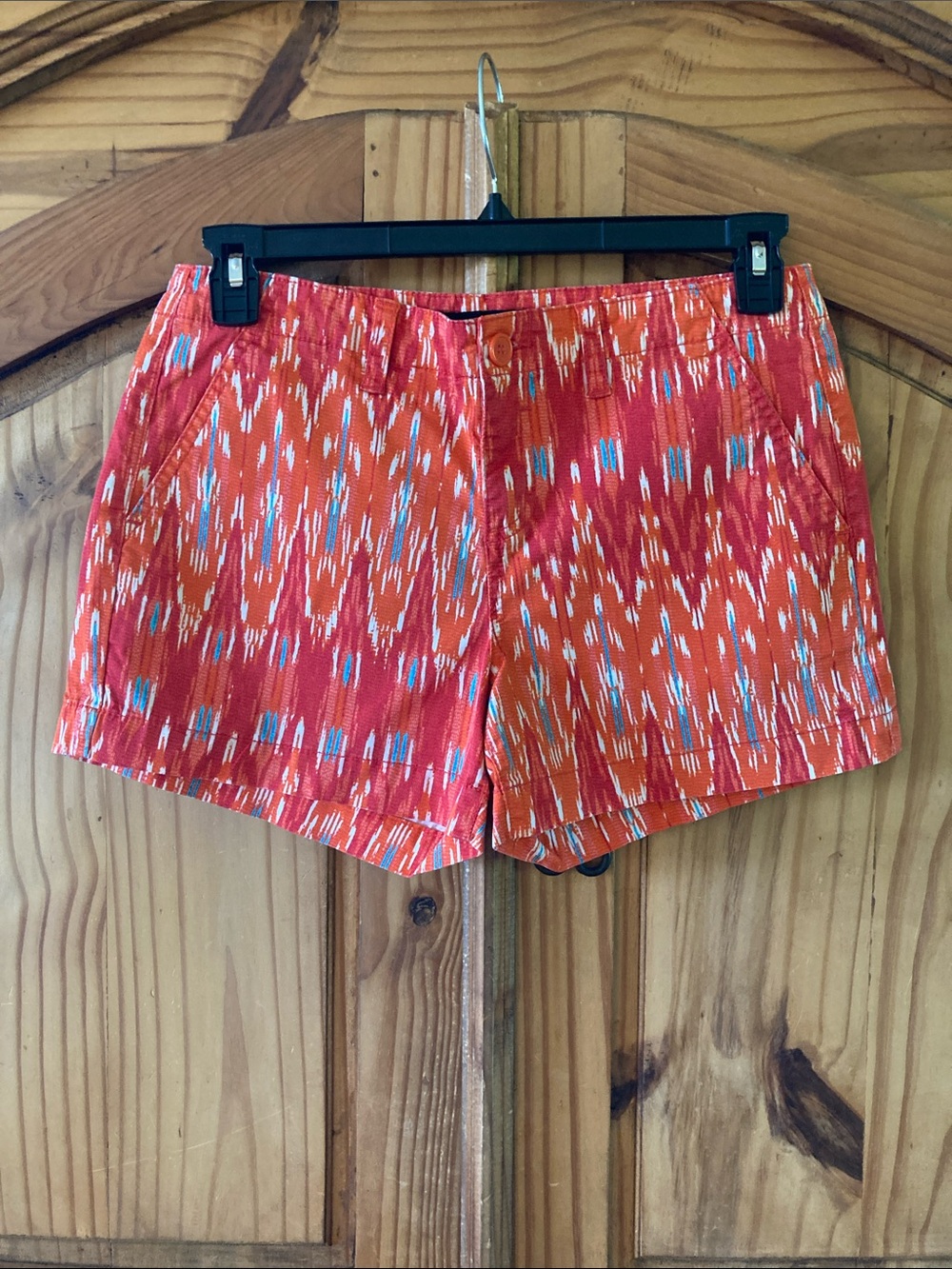 Women’s Calvin Klein orange white blue chino shorts size 8